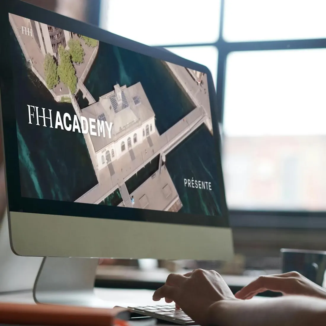 An FHH Academy presentation opening on a desktop screen