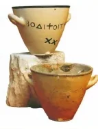 Two ancient clay water vessels